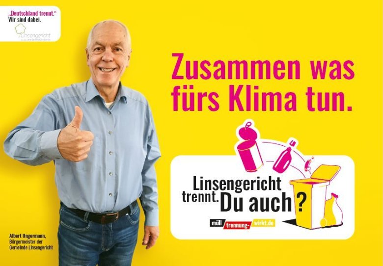 Bürgermeister Albert Ungermann vor dem Werbeplakat der Kampagne "Deutschland trennt"